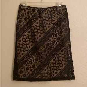 Beautiful lace over tan stretch waist zip up skirt